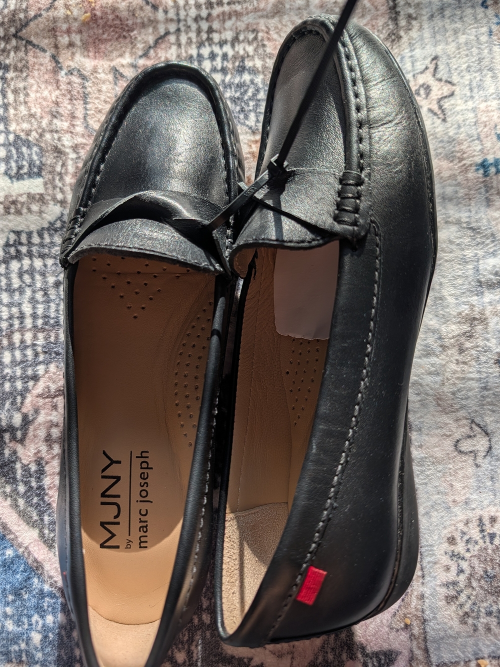 Marc Joseph Black Leather Penny Loafers with Red Accent